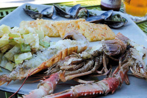 Crayfish and mussels with grilled pointed cabbage and cheese crackers 