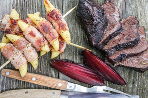 Braised ox cheeks with beetroot and potato noodle skewers 