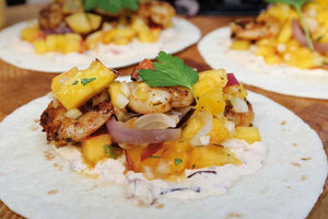 Tacos with shrimp, nectarine and onion salsa and smoky onion cream 