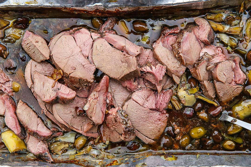 Leg of venison with olives on cream puree 