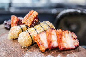 Pork belly praline with grilled summer roll 