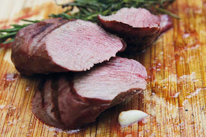 Whole grilled venison with rosemary-thyme potatoes 