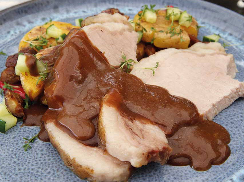 Roast pork in tobacco coating with crispy potato salad à la Kathi, chestnut crunch and black tea jus 
