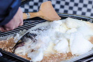 Salzkrusten-Wolfsbarsch mit Zitronen-Risotto